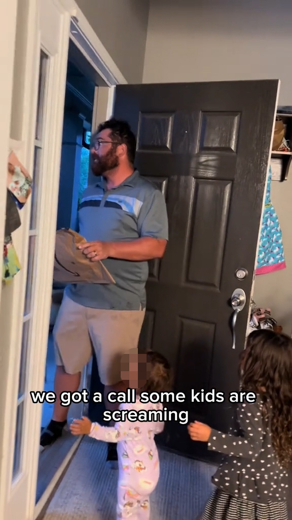 The Kaskie family talking to the cops at the door