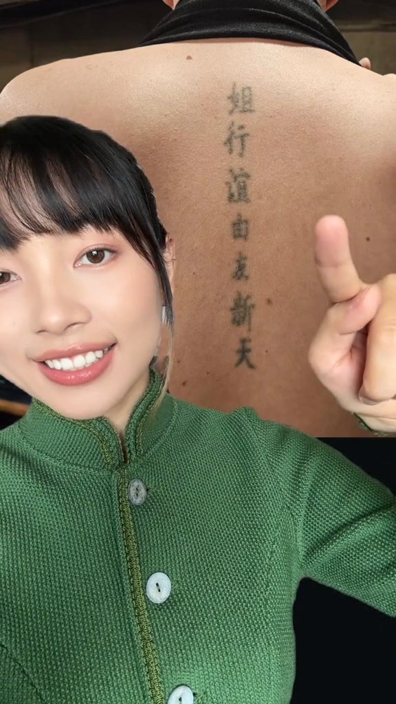 Jessie translating Chinese tattoos
