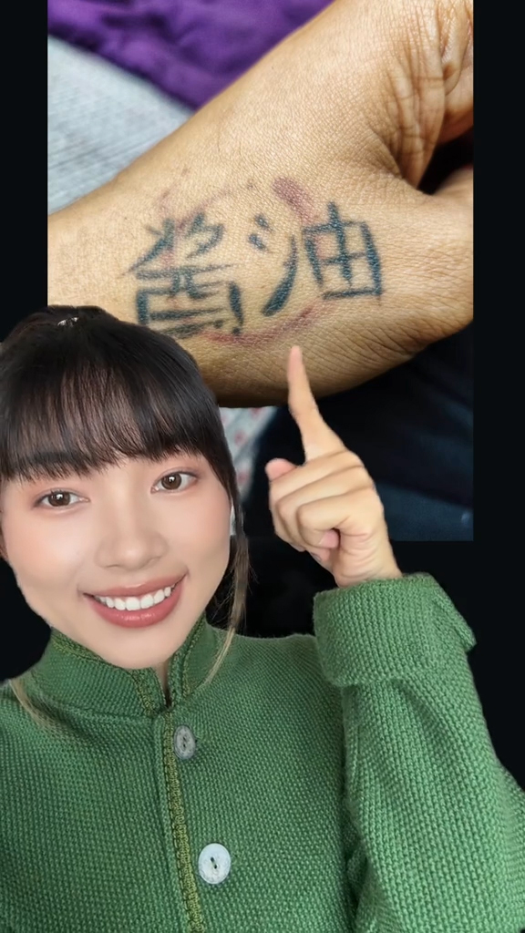 Jessie translating Chinese tattoos