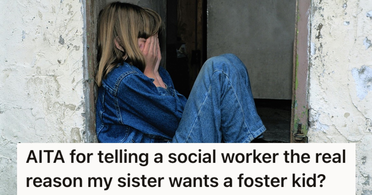 A child in denim crying in a doorway