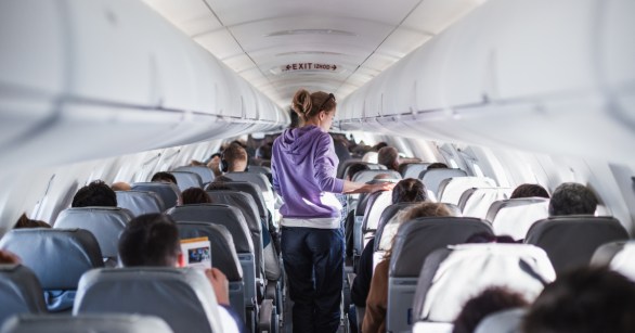 woman asking to switch seats on airplane