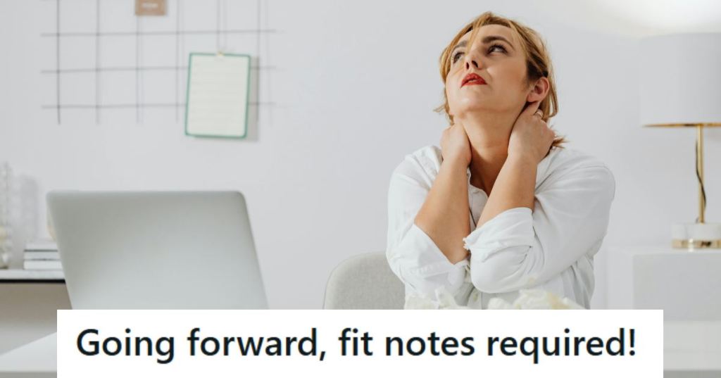 Woman struggling with back and neck pain at her desk