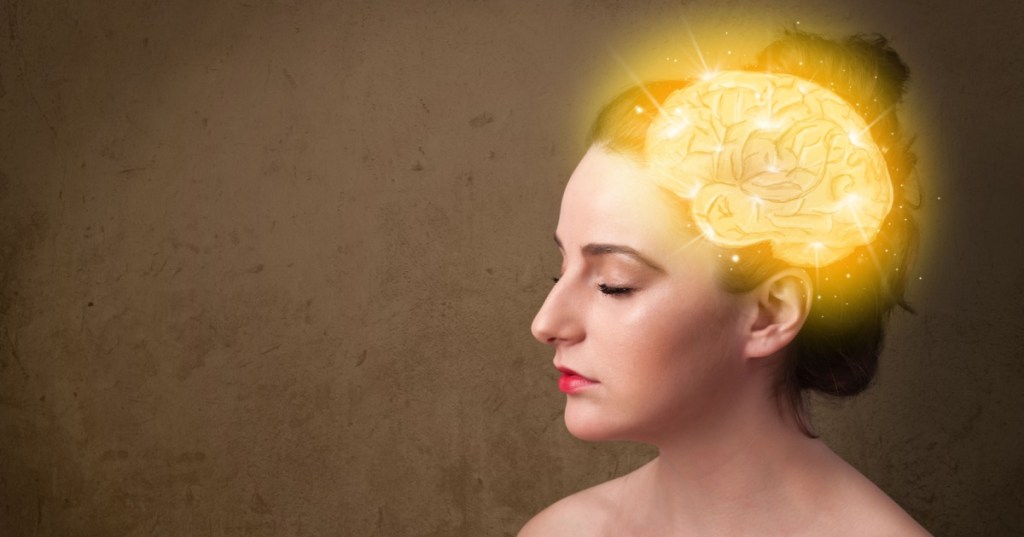 Woman with a glowing brain