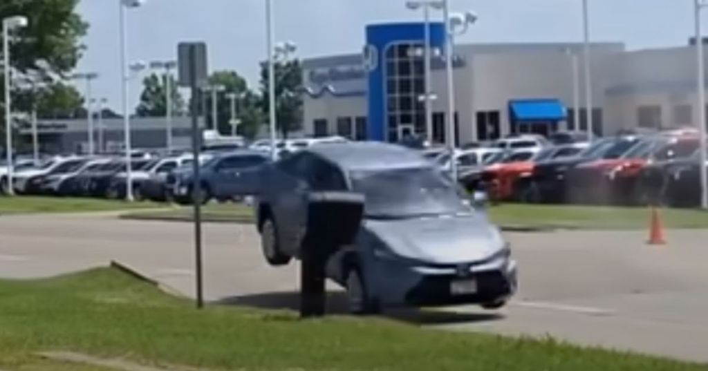 Car going over buckled road