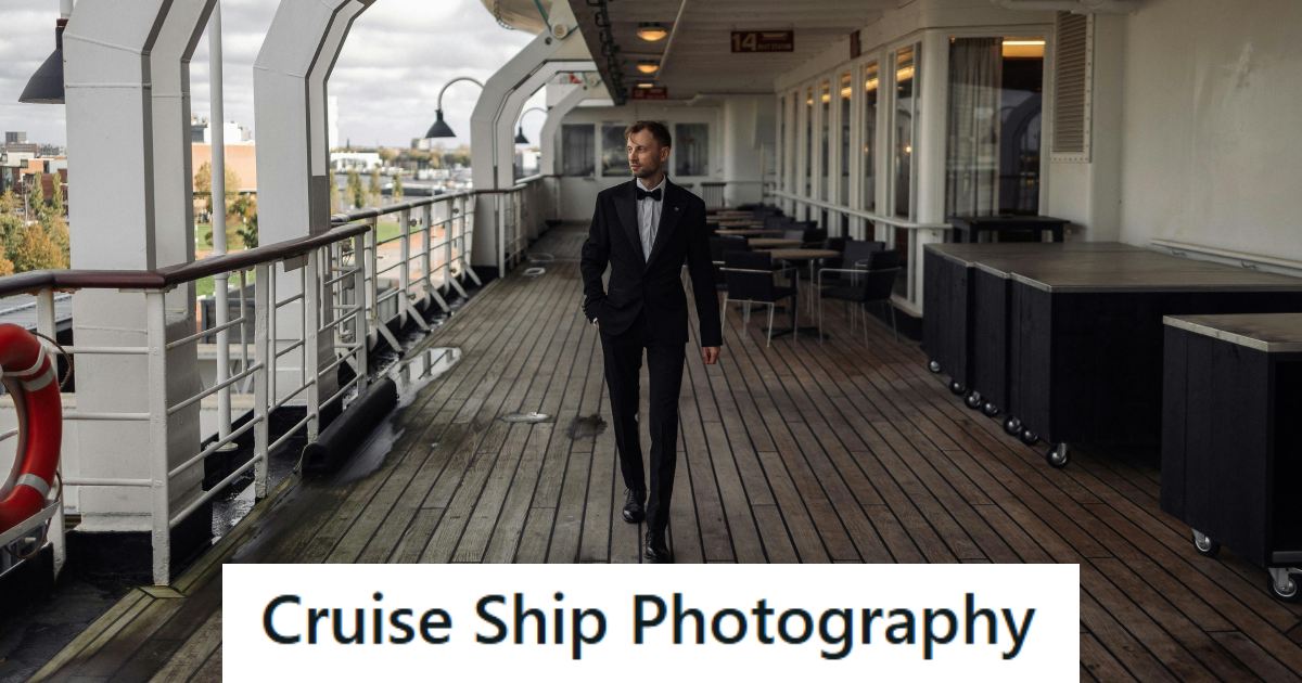 Cruise Ship photographer walking along the deck of the ship