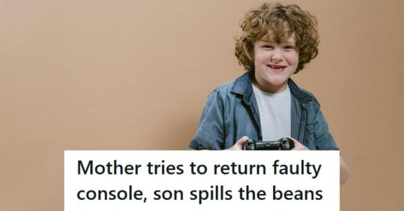 Curly-haired kid smiling and playing his video game