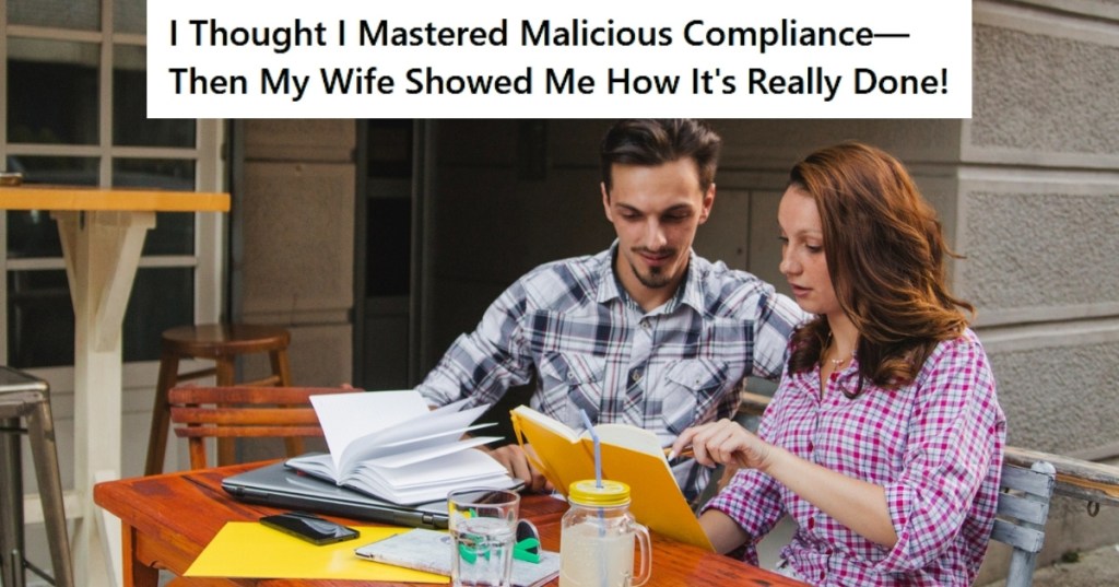 Couple talking at table outside