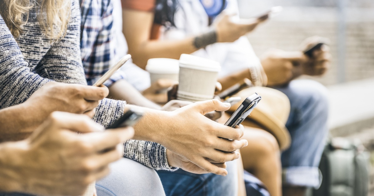 Group of people all on their phones
