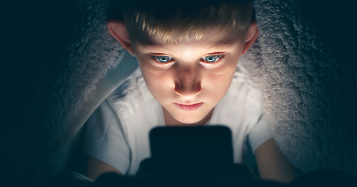 Child staring at screen
