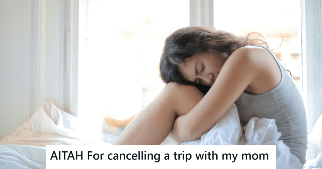 Girl sitting on bed sadly