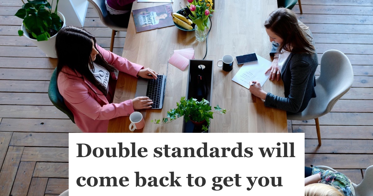  sitting around a desk at work