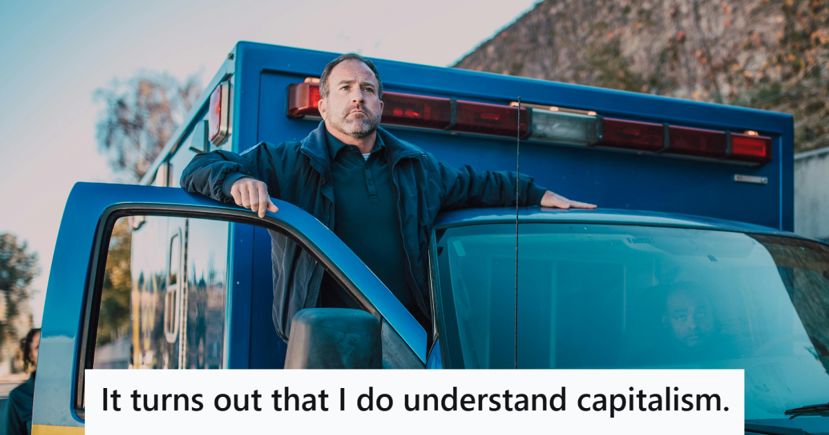 Paramedic standing at his ambulance