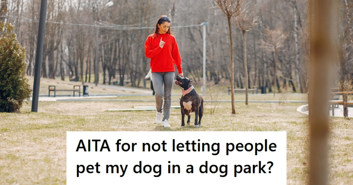 Woman walking dog at the park