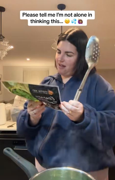 Woman reading cooking instructions