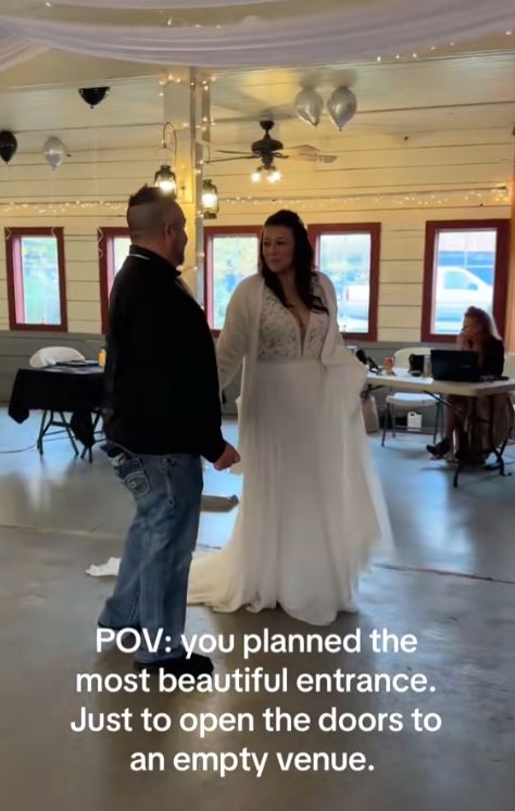 Couple walking down the aisle.