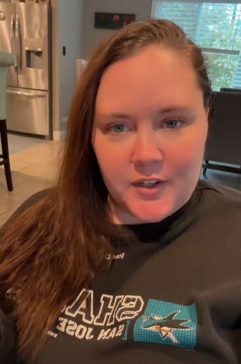 Woman talking to camera