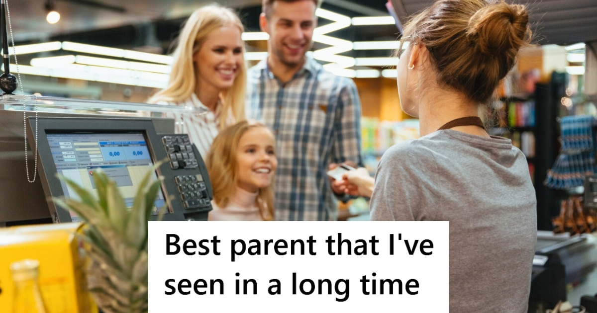 Happy family standing at cash counter