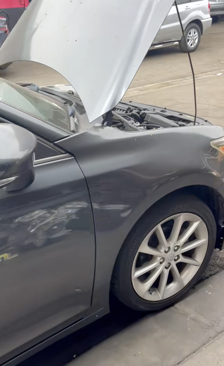 lexus with its hood up