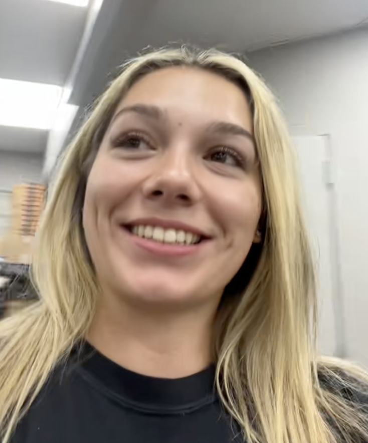 woman inside a 7-eleven store