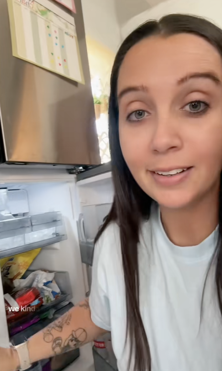 woman talking about her fridge