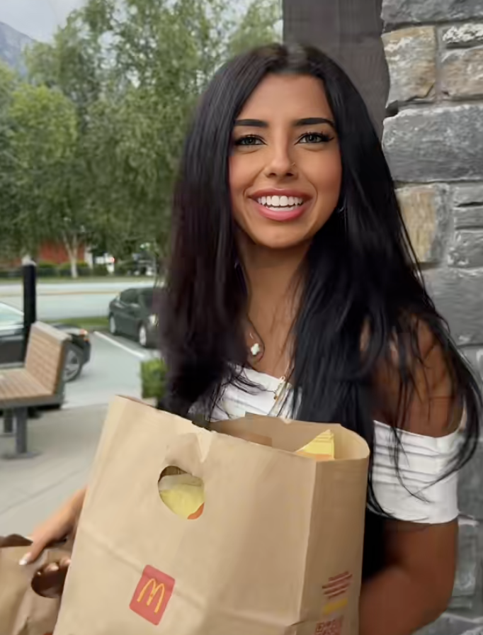 woman outside a mcdonald's