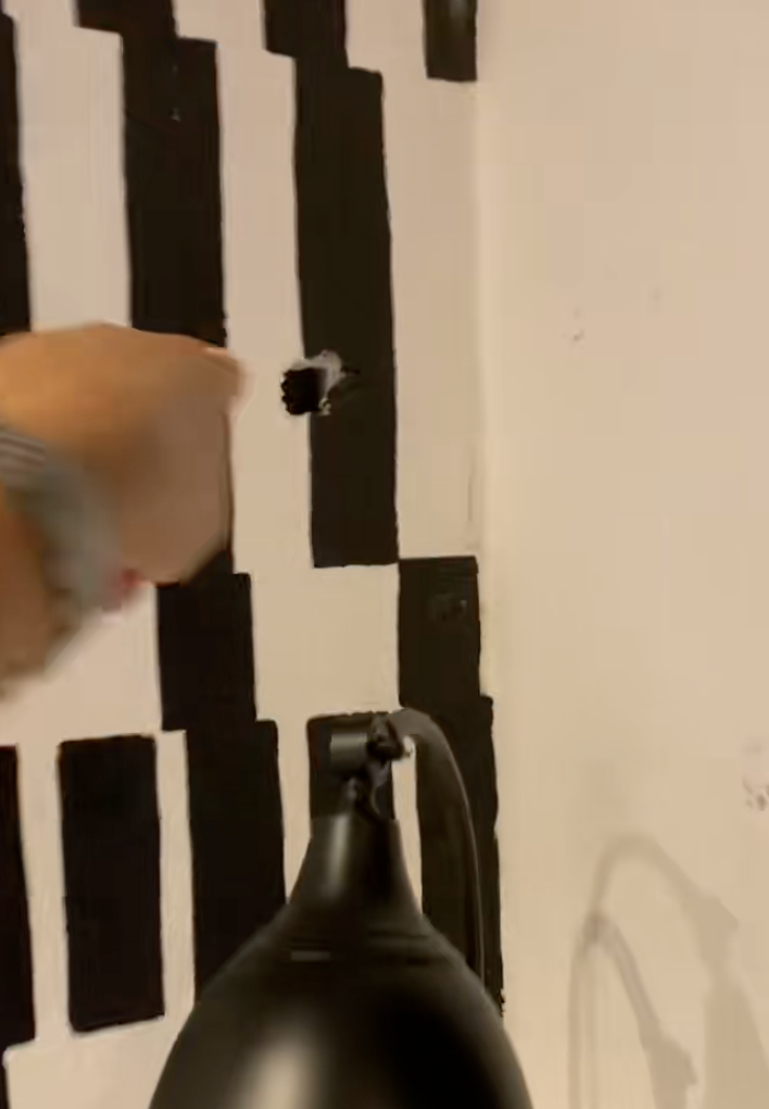 hotel room with a hole in the wall