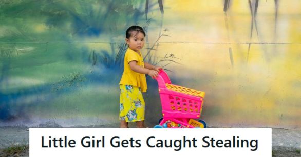 Little girl who loves to shop pushing her very own cart