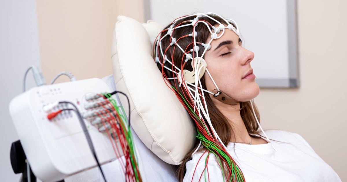 Woman with sensors for sleep test