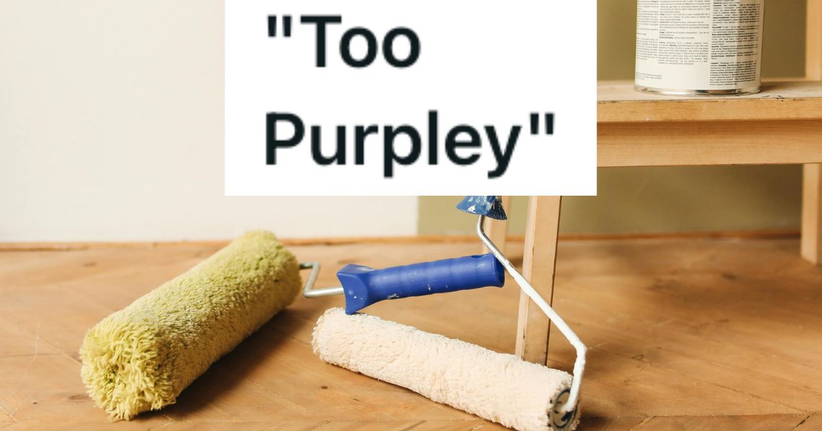 Paint rollers on the floor beside a can of paint