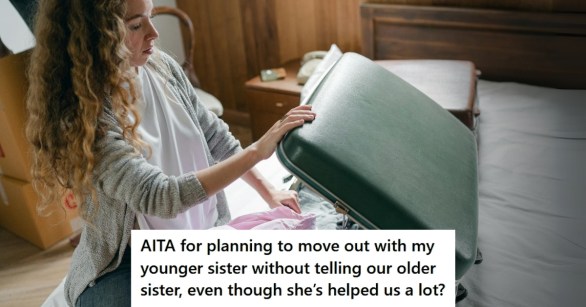 Woman packing suitcase