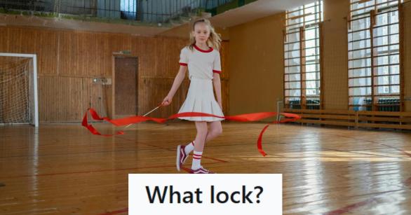 Blonde-haired girl playing with a ribbon in gym class