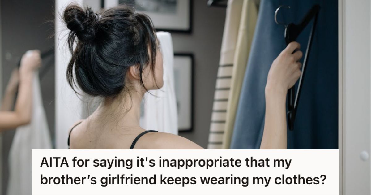 Woman going through the closet to pick a piece of clothing