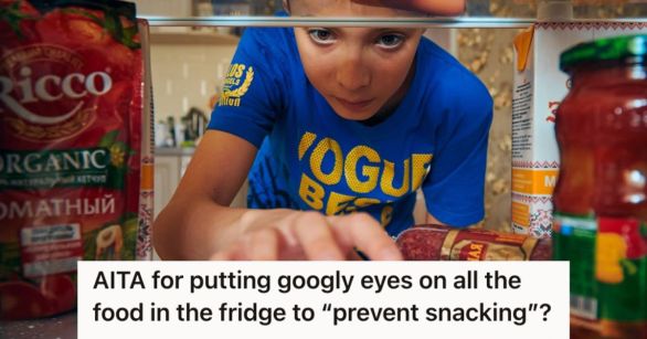 Boy picking out a snack from the refrigerator