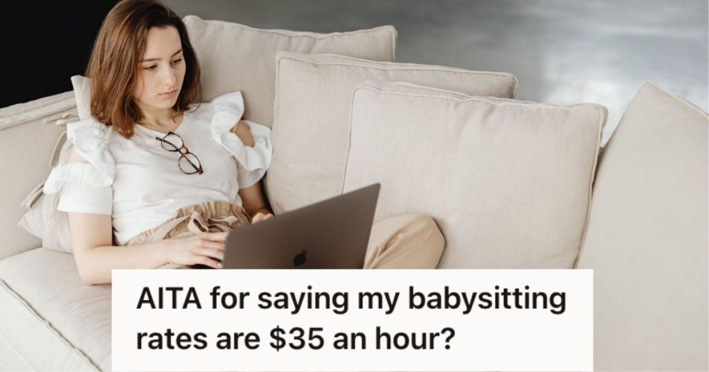 Woman working on her laptop while sitting on the couch