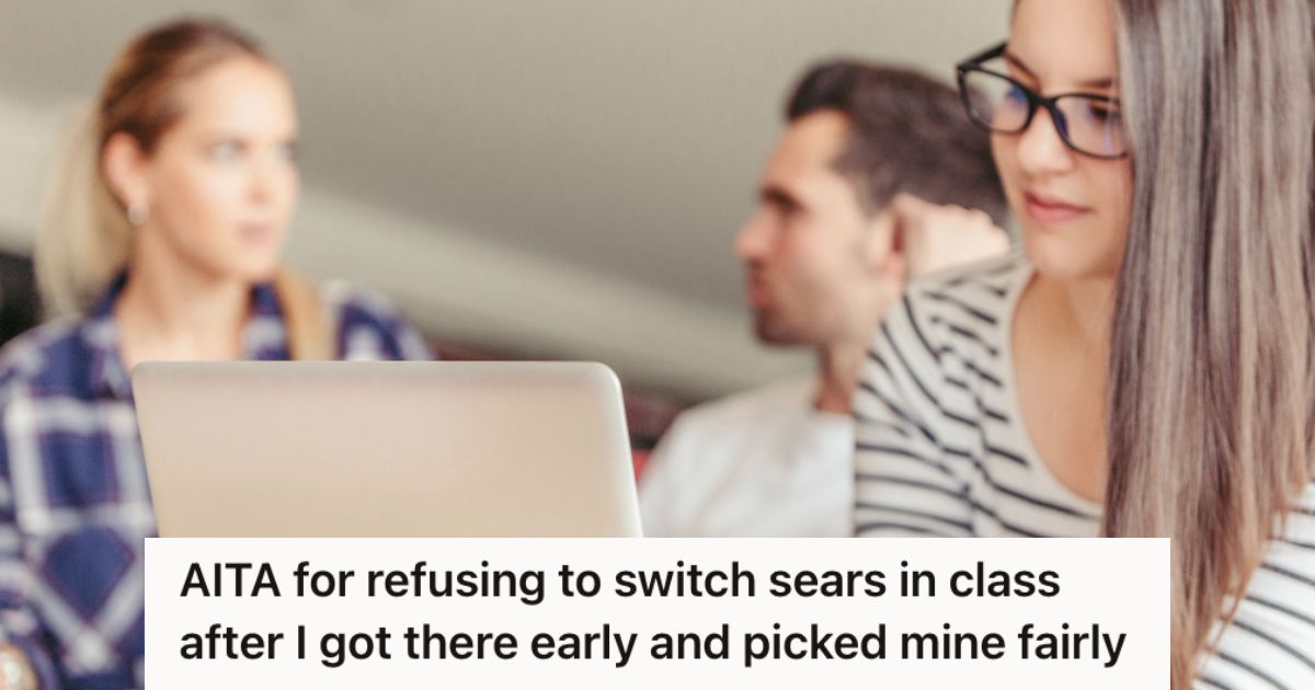 Female student using laptop while other students at the back are talking to each other