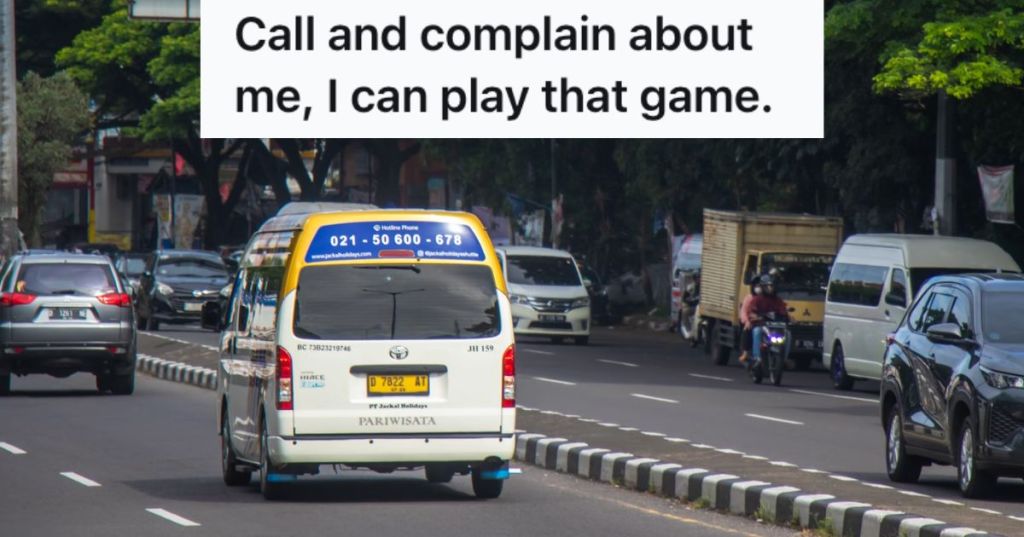 Company van with phone number on the road