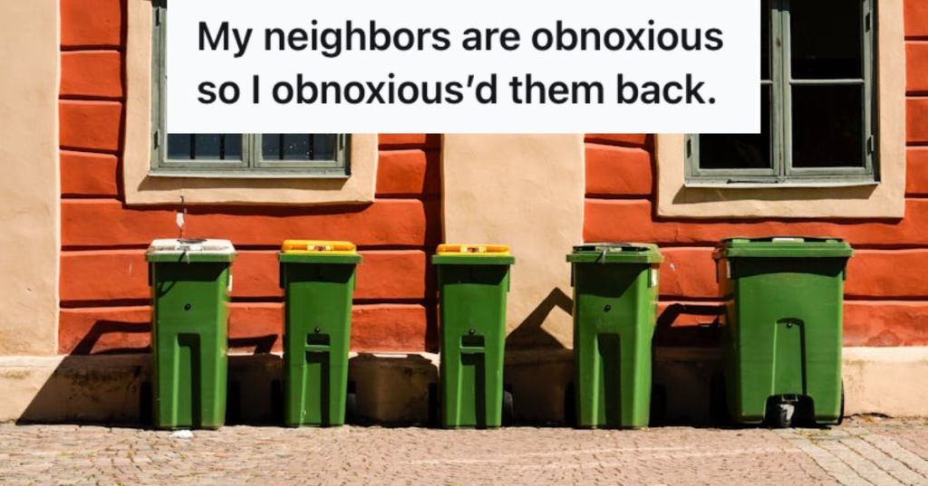 Green trash bins in front of a house