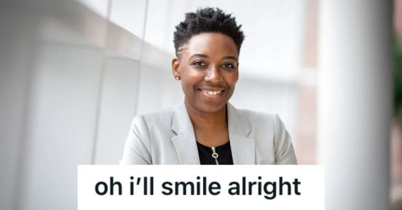 Employee in blazer smiling beautifully