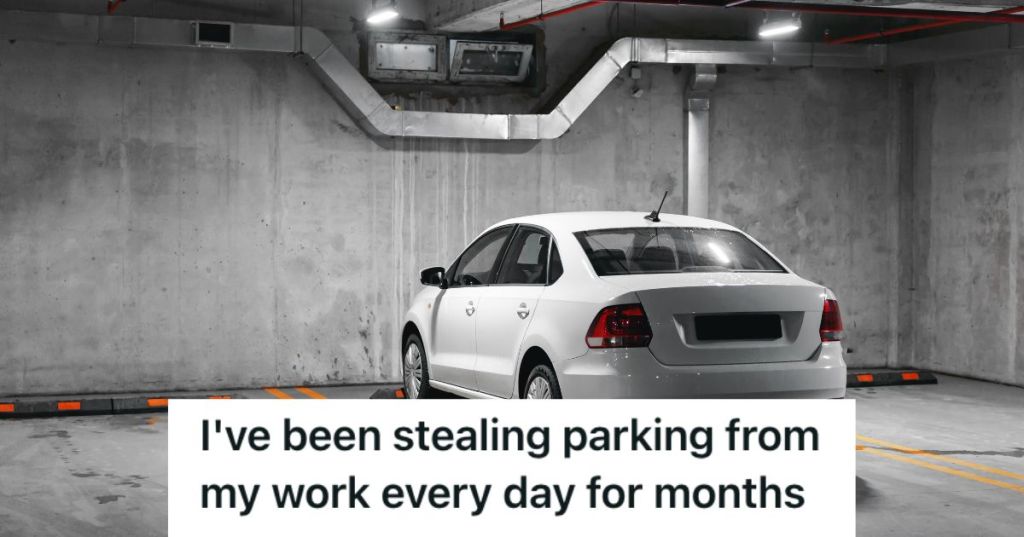 White car parked in a dark basement parking