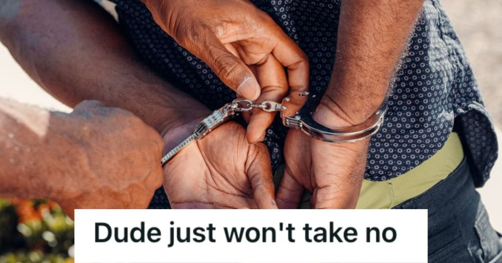 Man in handcuffs being escorted outside