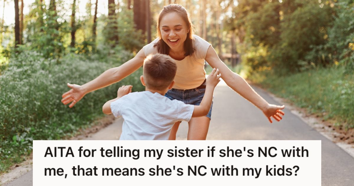 Woman playing with a young boy outdoors