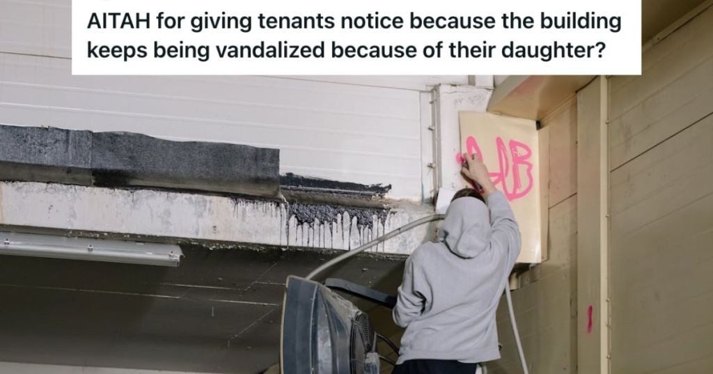 Person vandalizing a property's wall