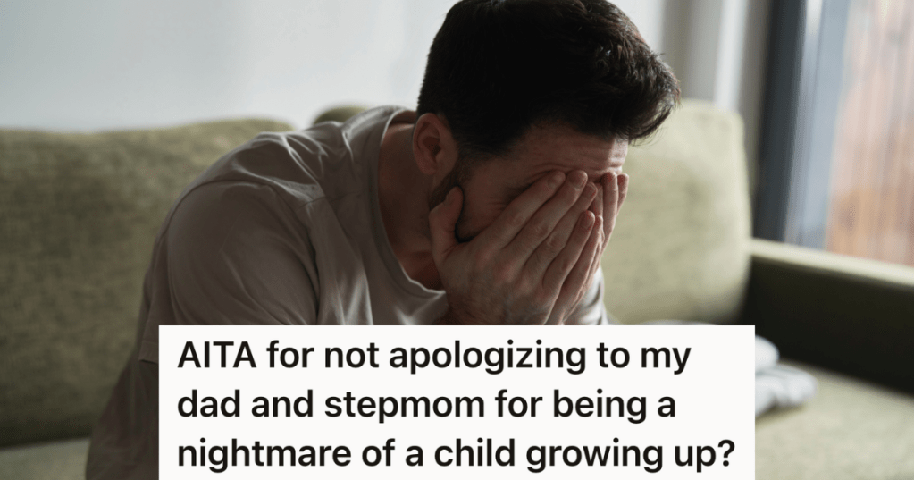 sad man with his hands covering his face