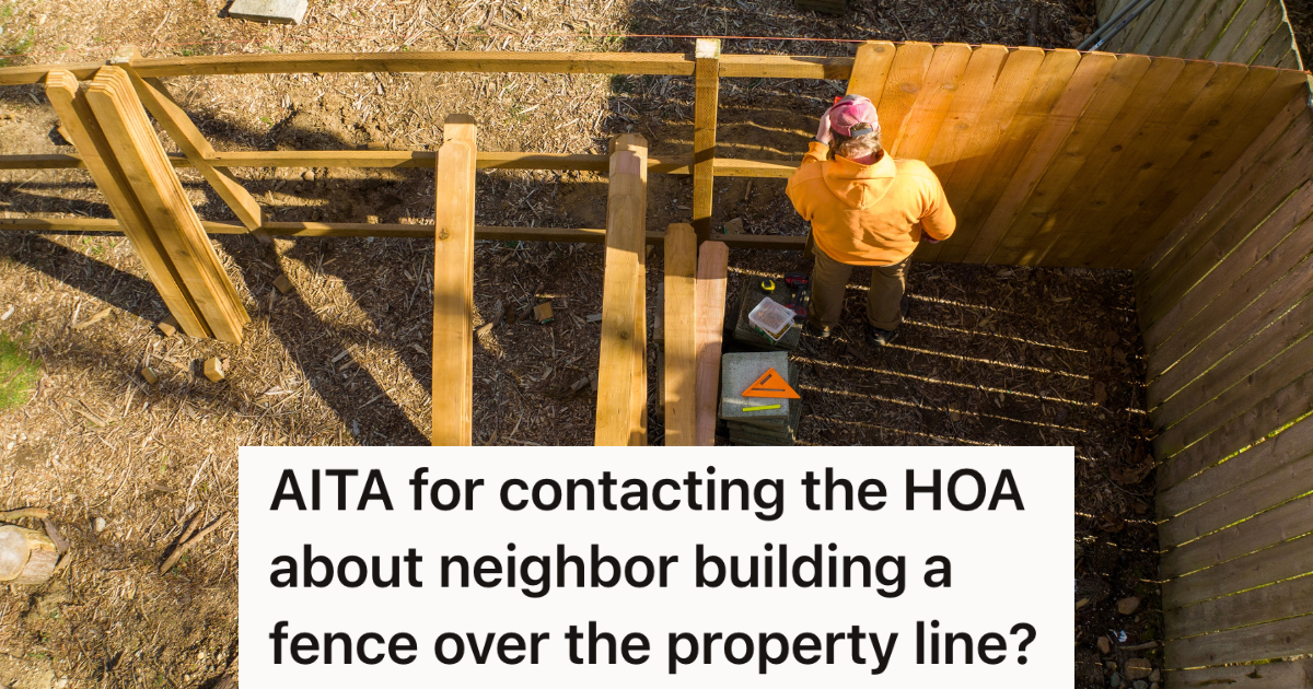 man building a wooden fence