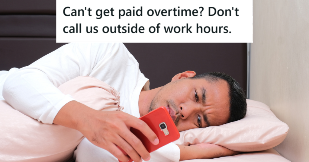 man lying in bed looking at his phone