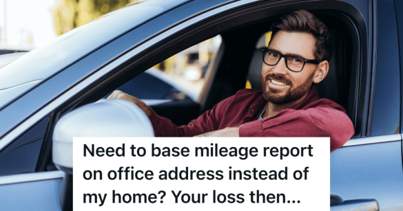smiling businessman in driver's seat of car