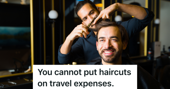 smiling man in a barber's chair getting a haircut