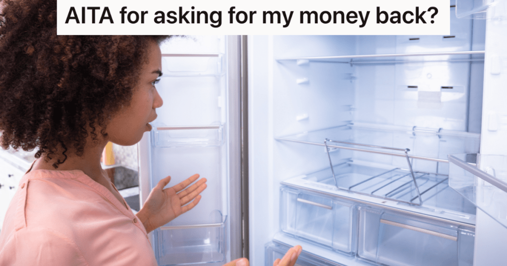 young woman looking in an empty refrigerator