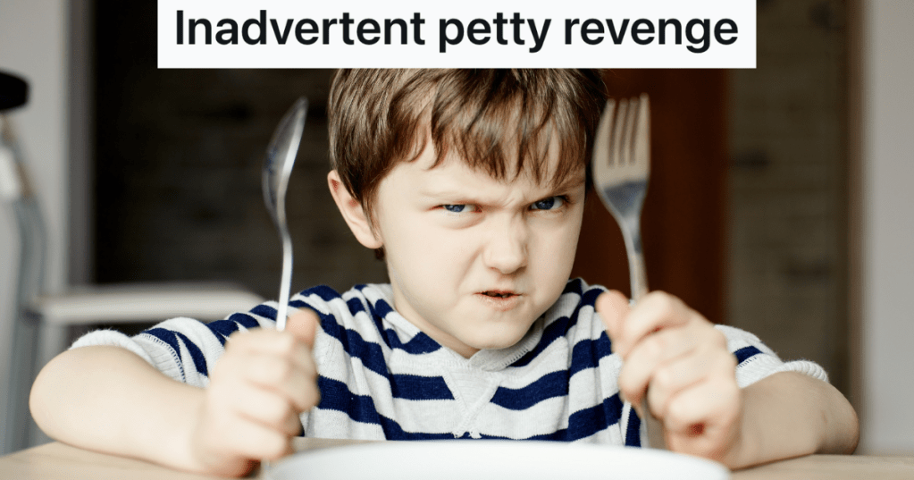 unhappy little boy holding knife and fork