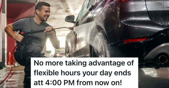 smiling man washing a car